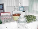 Much mid-century glassware, microwave, crock pot and much cookware 