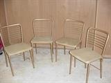 Four folding chairs