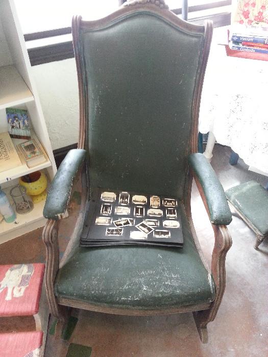 Old photographs and antique rocking chair