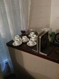 6 CHINA CUPS AND SAUCERS. NICE BOOKENDS AND OTHER GLASS