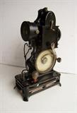 20s Hand Cranked French Pathex Model Movie Projector by Pathe. Has rare electric motor conversion.