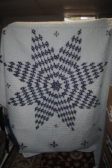 Old, hand sewn, hand quilted Texas star pattern quilt.