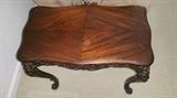 Antique end table that matches coffee table. 