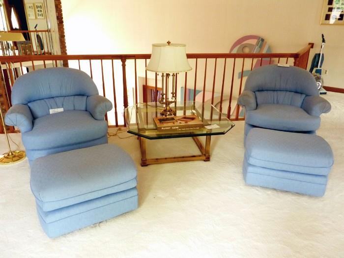 Blue Club Chairs with Ottomans. Brass and Glass Coffee Table, Brass Lamp