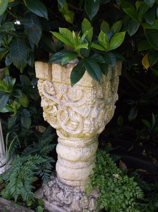 Ornate garden pedestal