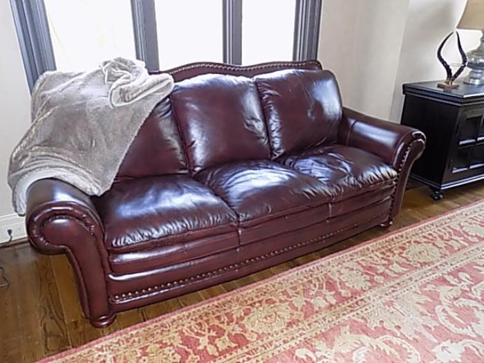 Pair of  Excellent  condition Chocolate Brown Leather  studded sofas ! 