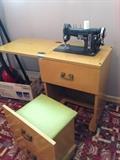 Older Necchi sewing machine with a cool cabinet & bench