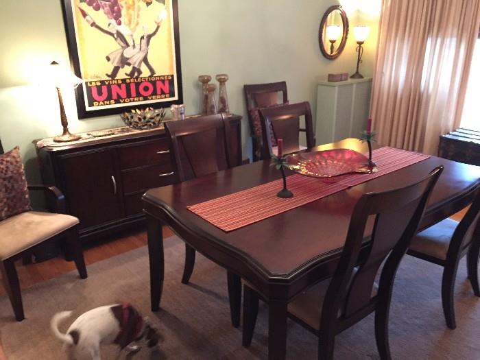 dining set includes 6 chairs and leafs 