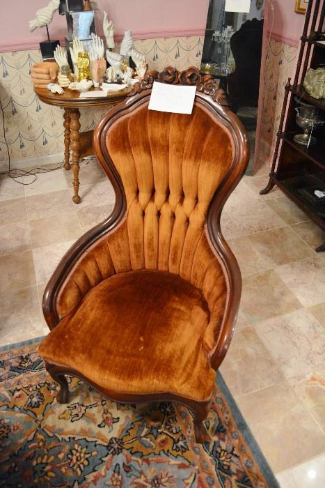 one of a pair of vintage rose carved back parlor chairs
