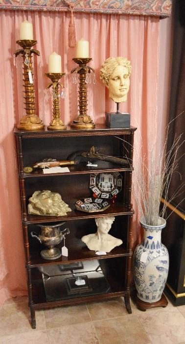 stepback mahogany bookshelf with decorative accessories