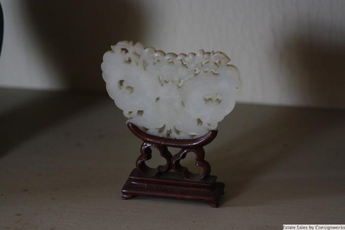 Carved jade on rosewood stand