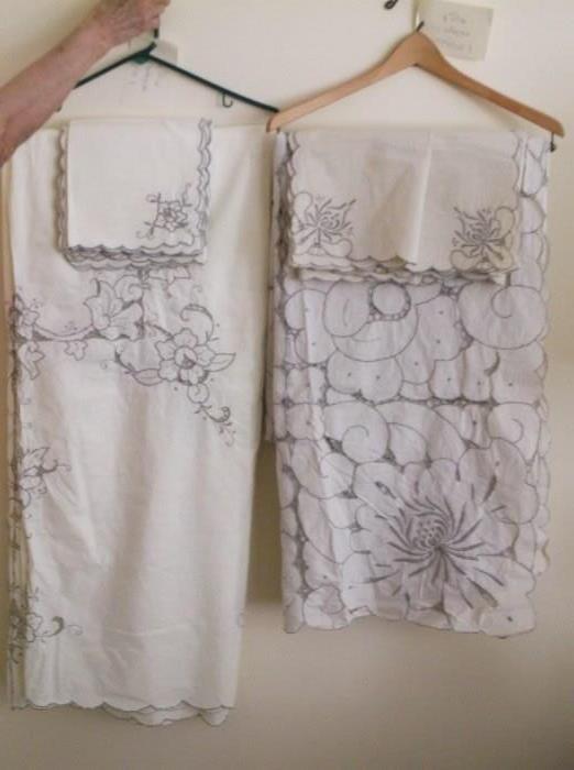Cutwork and embroidered tablecloths with 12 napkins