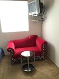 sassy red and zebra print loveseat or large armchair