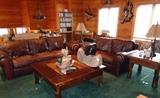 Legacy Two Tone Brown Leather Couch, Love Seat. Beautiful Heavy wood with iron accents coffee table & end tables.