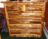 Two Custom made knotty pine log dressers.