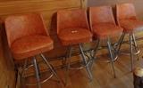 Four 1950's vinyl & chrome bar stools