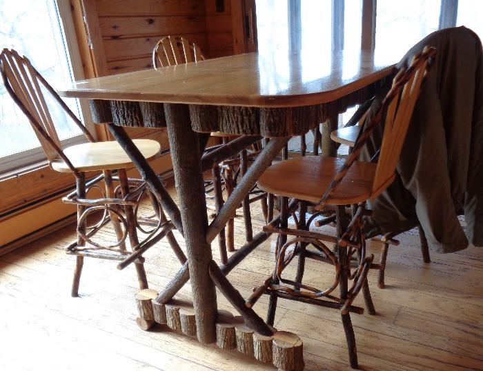 Beautiful barkwood kitchinette set with 4 matching chairs.