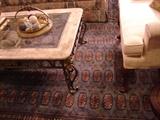 The Bokhara rug is a grey blue, and an interesting change from the red usually seen.