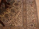 Beautiful silk rug. Natural ground with sky blue and brown design.