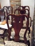 Chairs shown are part of a dining room table and chairs set. Table not shown due to lack of space.