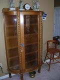 Curved front display cabinet
