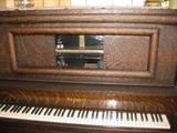 1916 Woodward player piano with box full of rolls