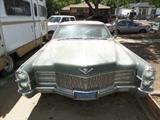 1965 Cadillac Coupe DeVille. It hasn't been driven in years, but will start. Needs lots of TLC.
