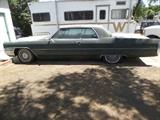 1965 Cadillac Coupe DeVille. It hasn't been driven in years, but will start. Needs lots of TLC.