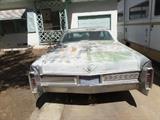 1965 Cadillac Coupe DeVille. It hasn't been driven in years, but will start. Needs lots of TLC.