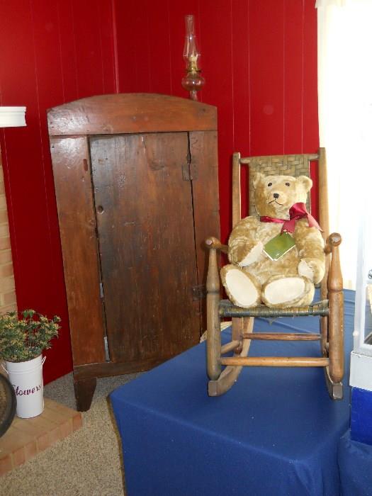 vintage rocking chair, bear, 1850's 1 door cupboard, etc.