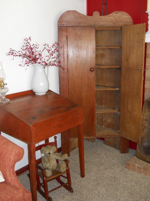 primitive corner cupboard, school master's desk, child's rocker, Steiff bear, etc.