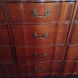 Lots of draws on that dresser. 