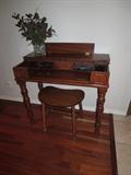 Antique refurbished desk and stool; really cute and a perfect size.  Could be used for a vanity.