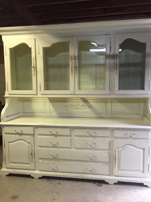 Replica of Antique European hutch with measurements of 24" deep x 94" tall x 97" wide. Adjustable shelves. Excellent condition, stunning piece. Retails for $7,500… asking $6,250.00.