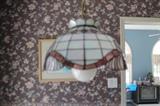 Kitchen chandelier in purple leaded glass hues.