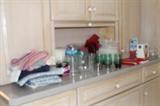 Kitchen things including plastic containers.
