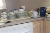 Everyday dishes and mugs.
