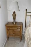 Night table and lamp.