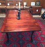 great old dining table with leaves that hide underneath reduced to seat four