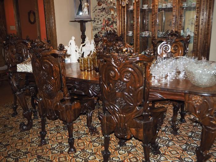 Gorgeous hand carved dining room table made from black walnut. Solid construction; truly one of a kind.