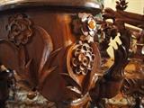 Detail on carved black walnut dining room table