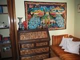 Secretary desk and peacock tapestry