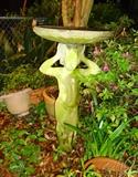 Concrete statue birdbath
