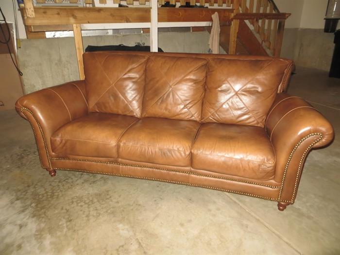 Matching brown leather couch