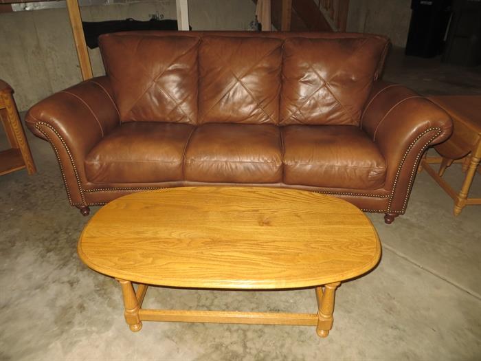 Ethan Allen end tables and matching coffee table. Gorgeous leather couch. (in the garage because of recent new carpeting.)