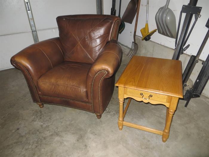 Ethan Allen end tables and matching coffee table. Gorgeous leather armchair.(in the garage because of recent new carpeting.)