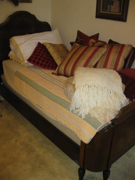 1930's twin bed and assorted pillows