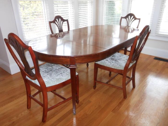 Dining table with four shield back chairs