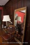 Antique floor mirror and Haywood Wakefield leather chair