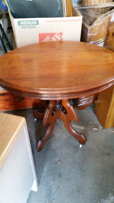 Nice round side table, original casters, better than great condition!